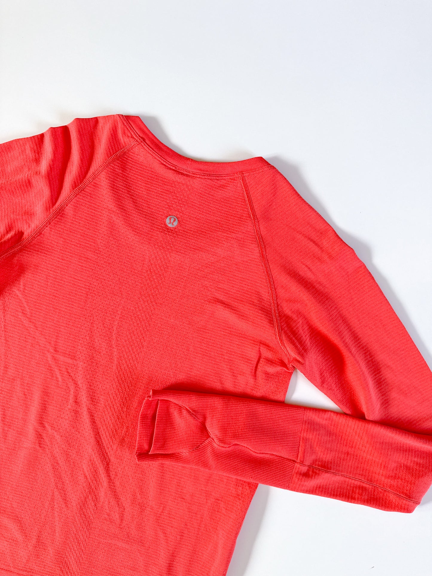 Size 4 Hot Sunset Swiftly Tech Long Sleeve 2.0 race