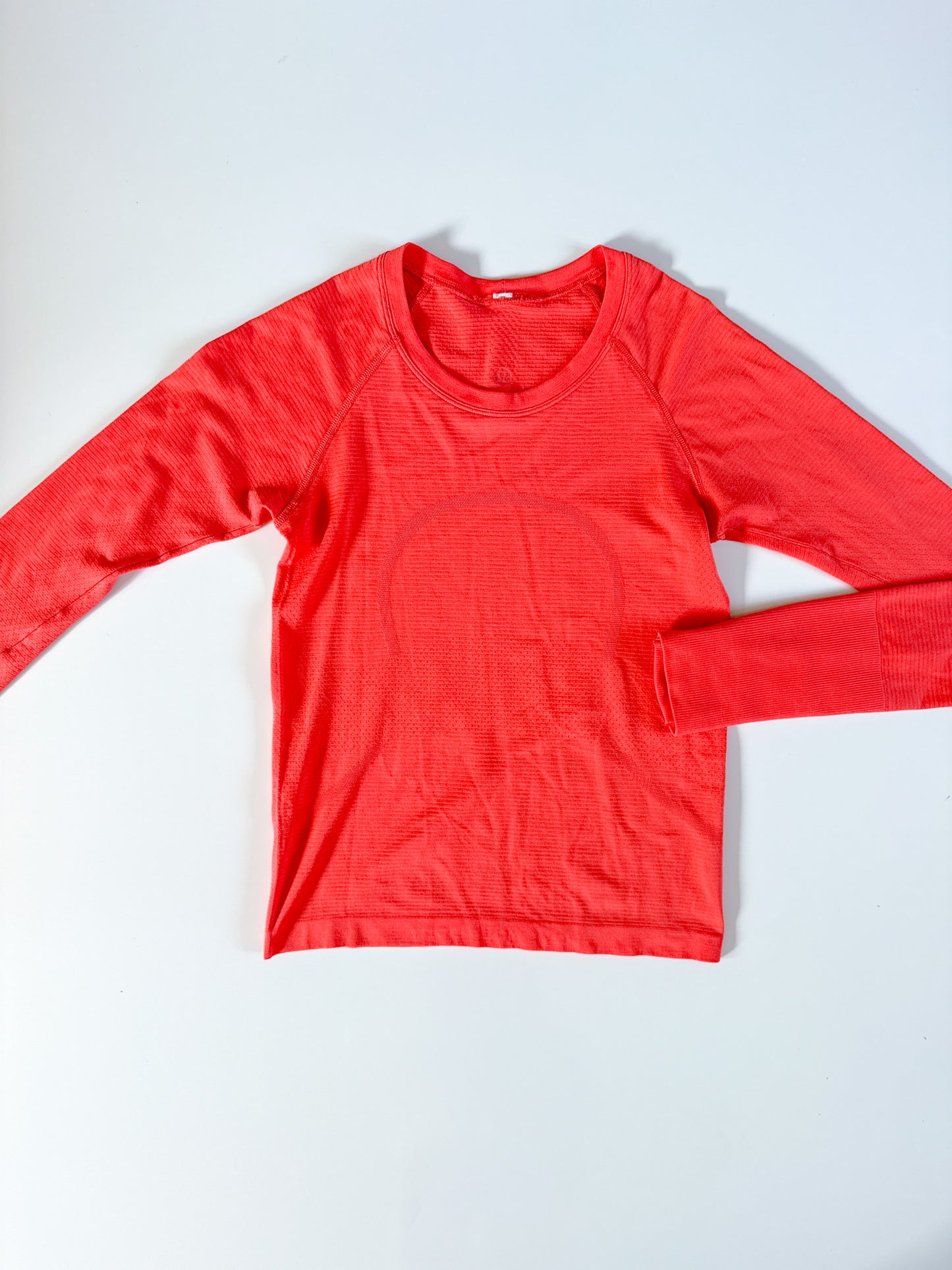 Size 4 Hot Sunset Swiftly Tech Long Sleeve 2.0 race