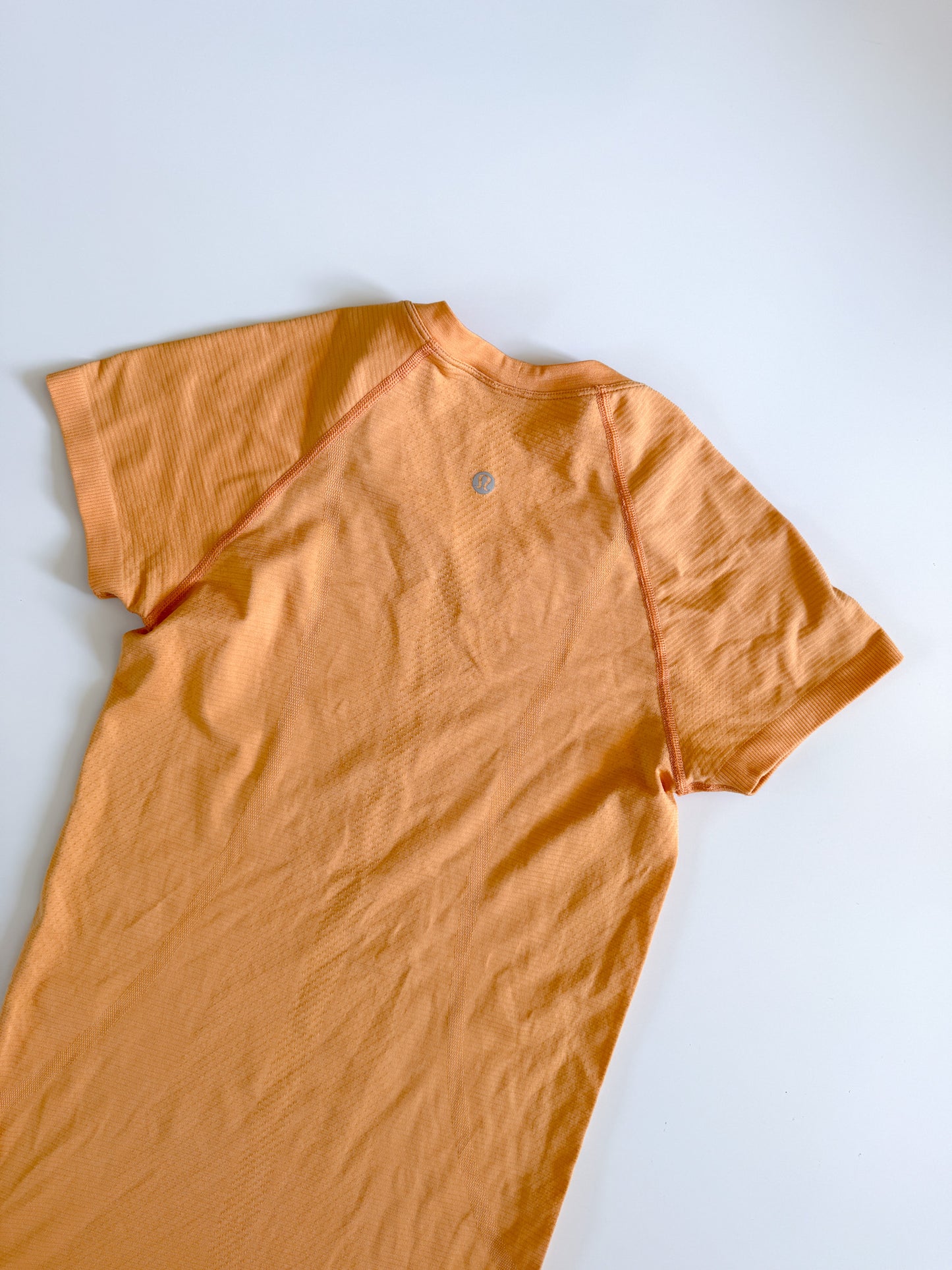 Size 4 Orange Swiftly Tech Short Sleeve 2.0