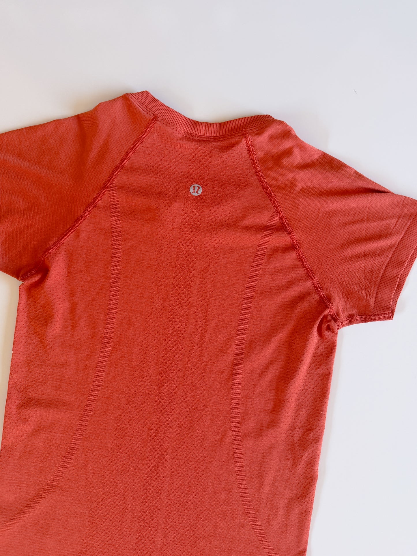 Size 4 Orange Swiftly Tech Short Sleeve 2.0