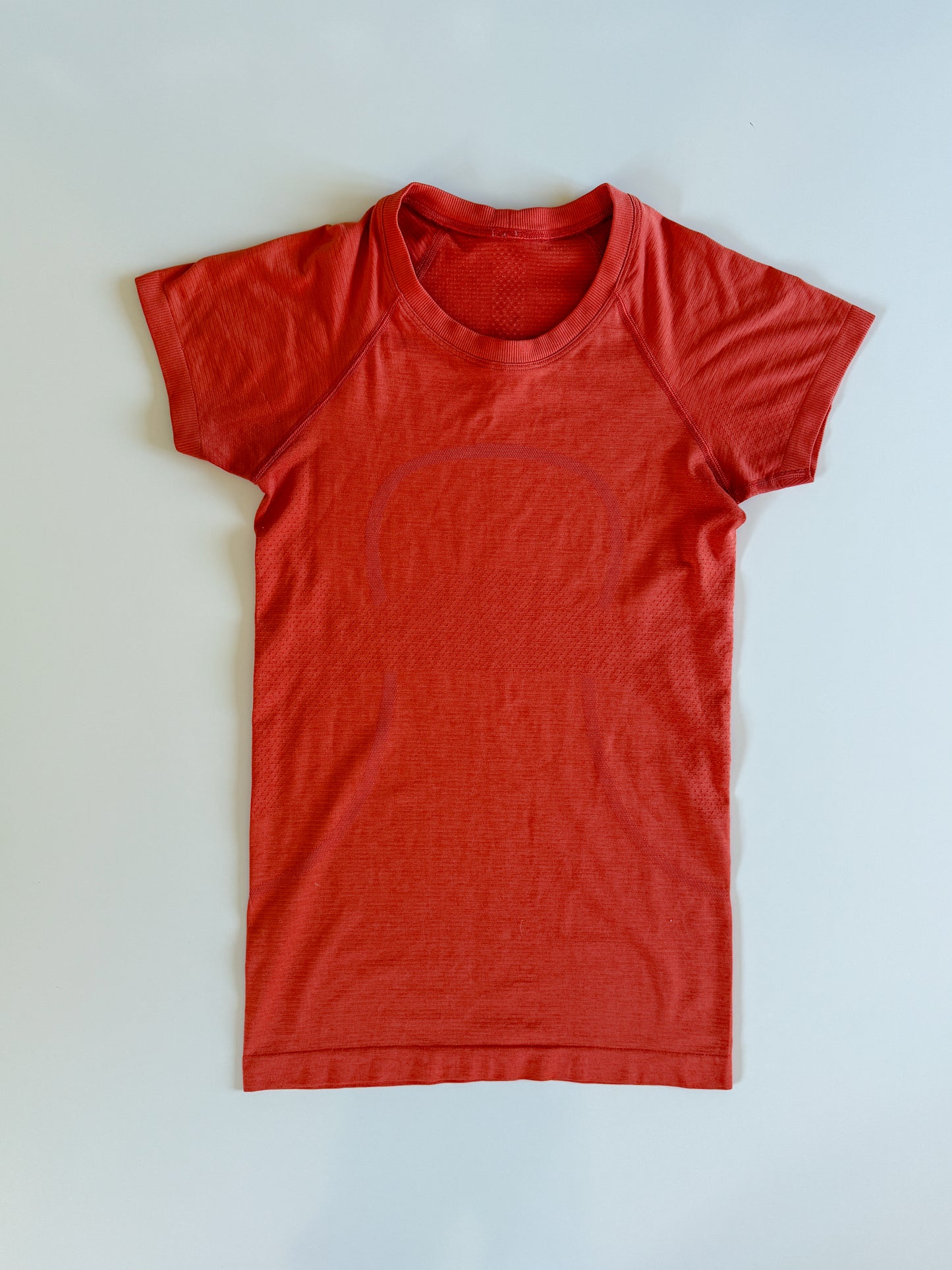 Size 4 Orange Swiftly Tech Short Sleeve 2.0