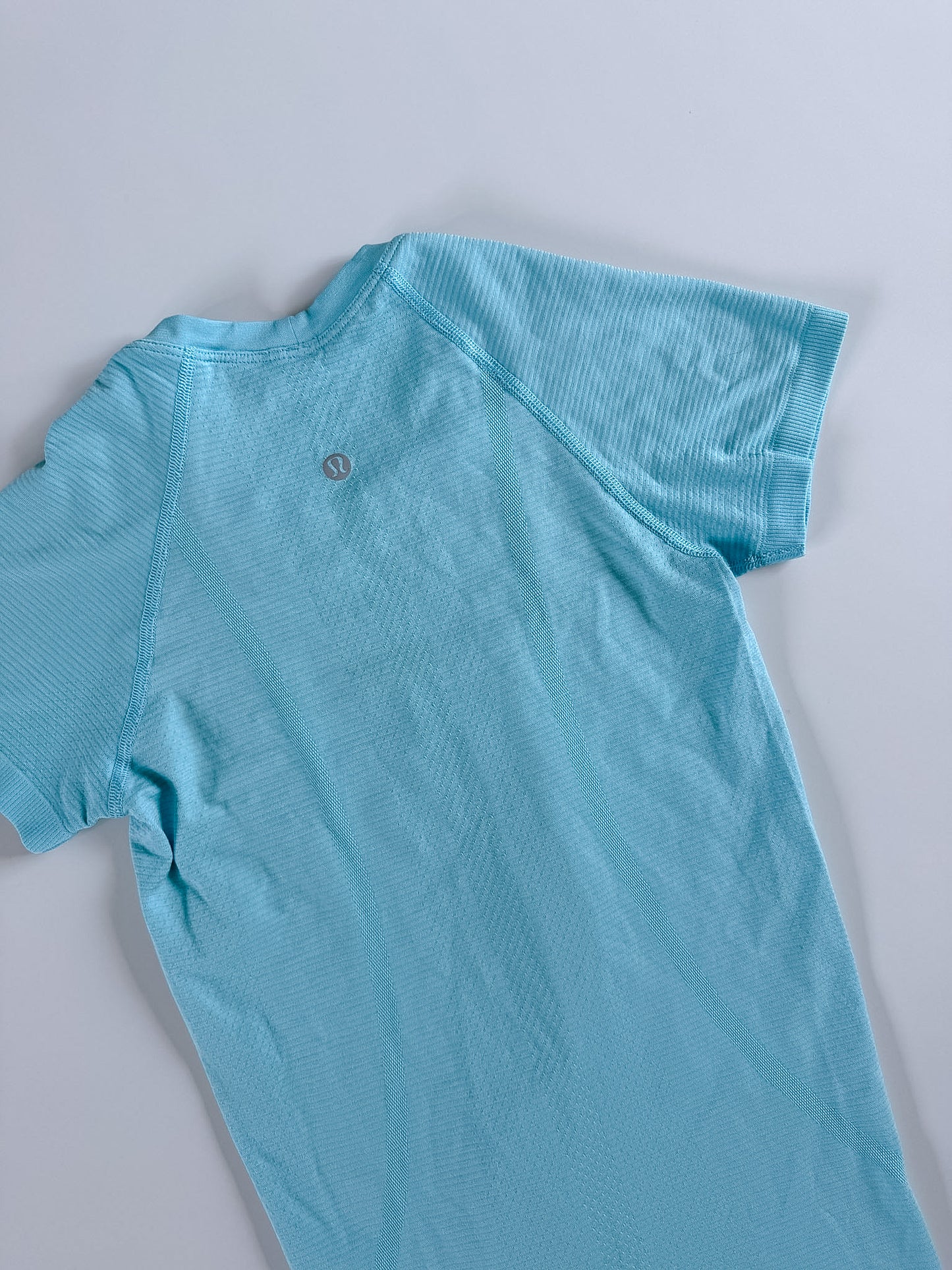 Size 4 Icing Blue Swiftly Tech Short Sleeve 2.0