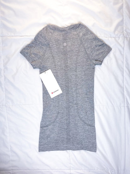 Size 4,8,12,14 NWT Gray Swiftly Tech 2.0