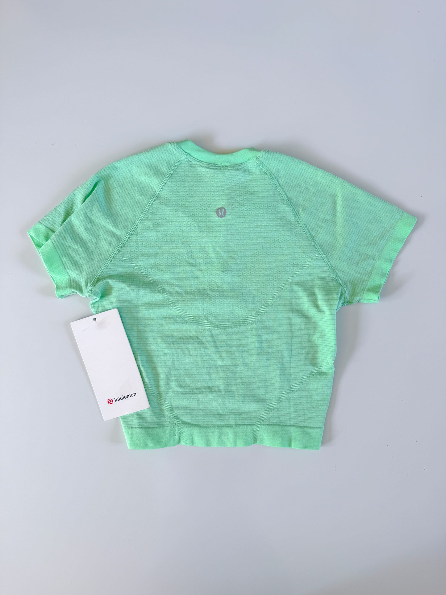 Size 4 NWT Citrus Lime Swifly Tech Short Sleeve Crop