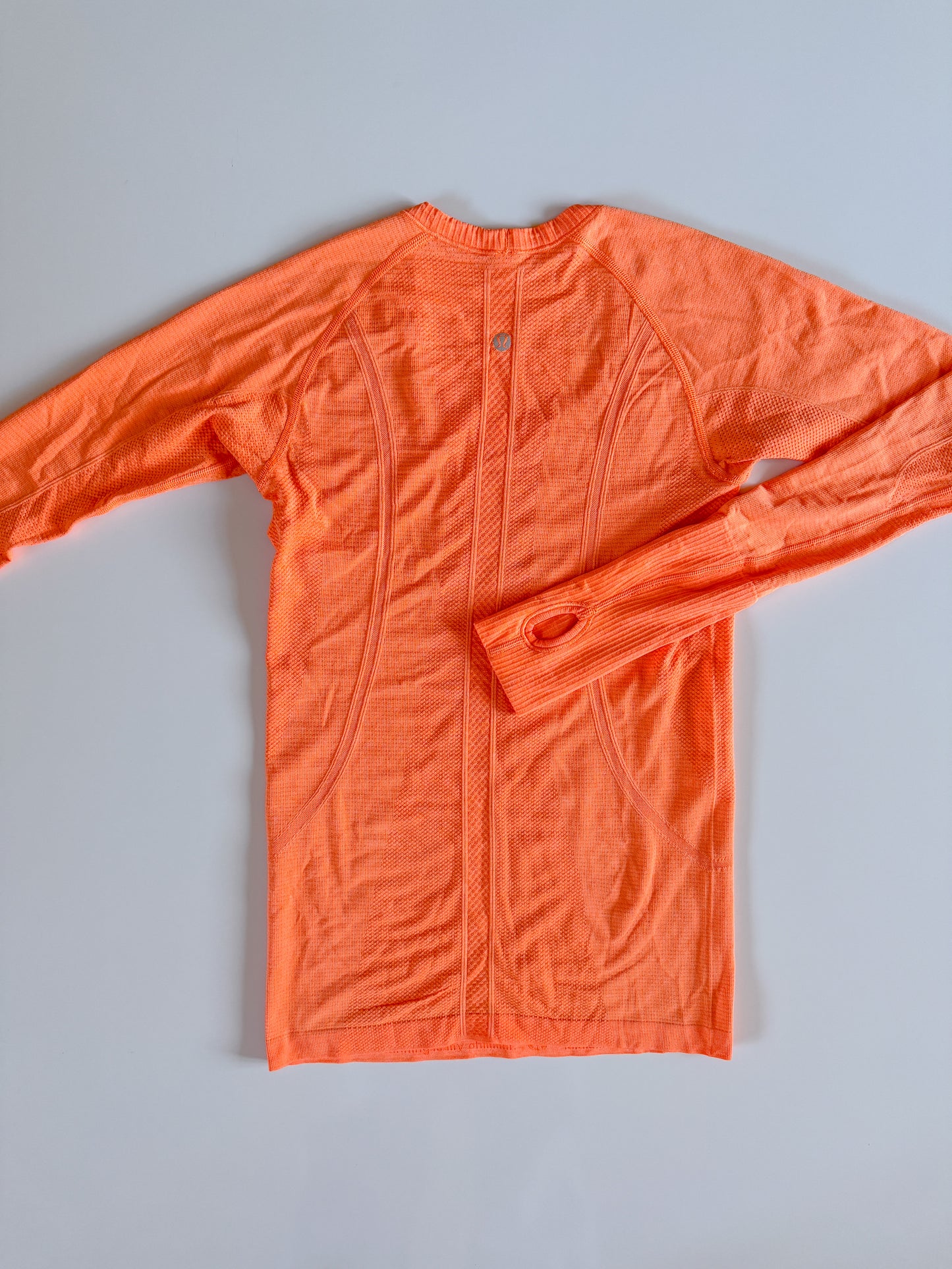 Size 6 Orange Soda Swiftly Tech Long Sleeve