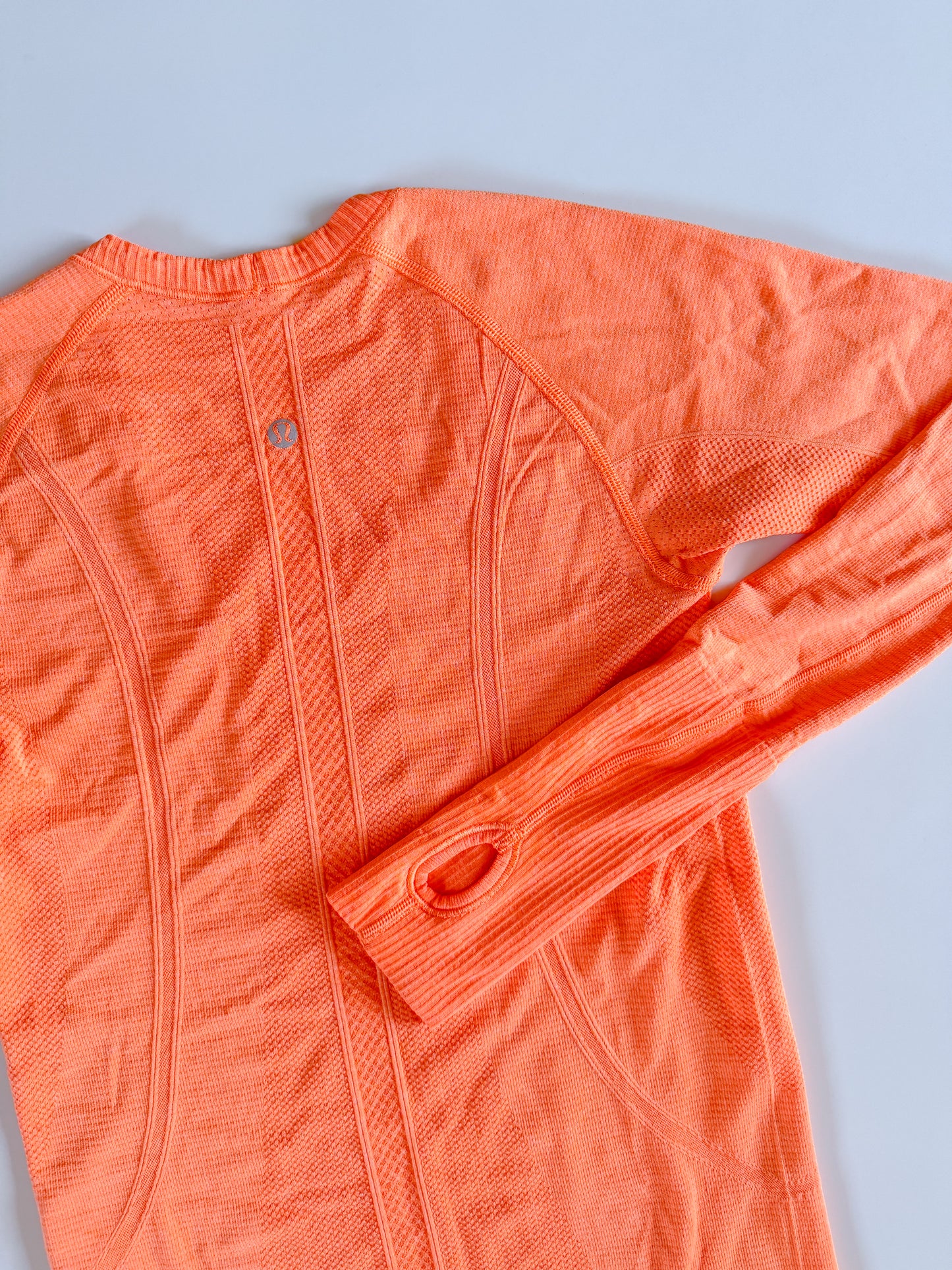 Size 6 Orange Soda Swiftly Tech Long Sleeve