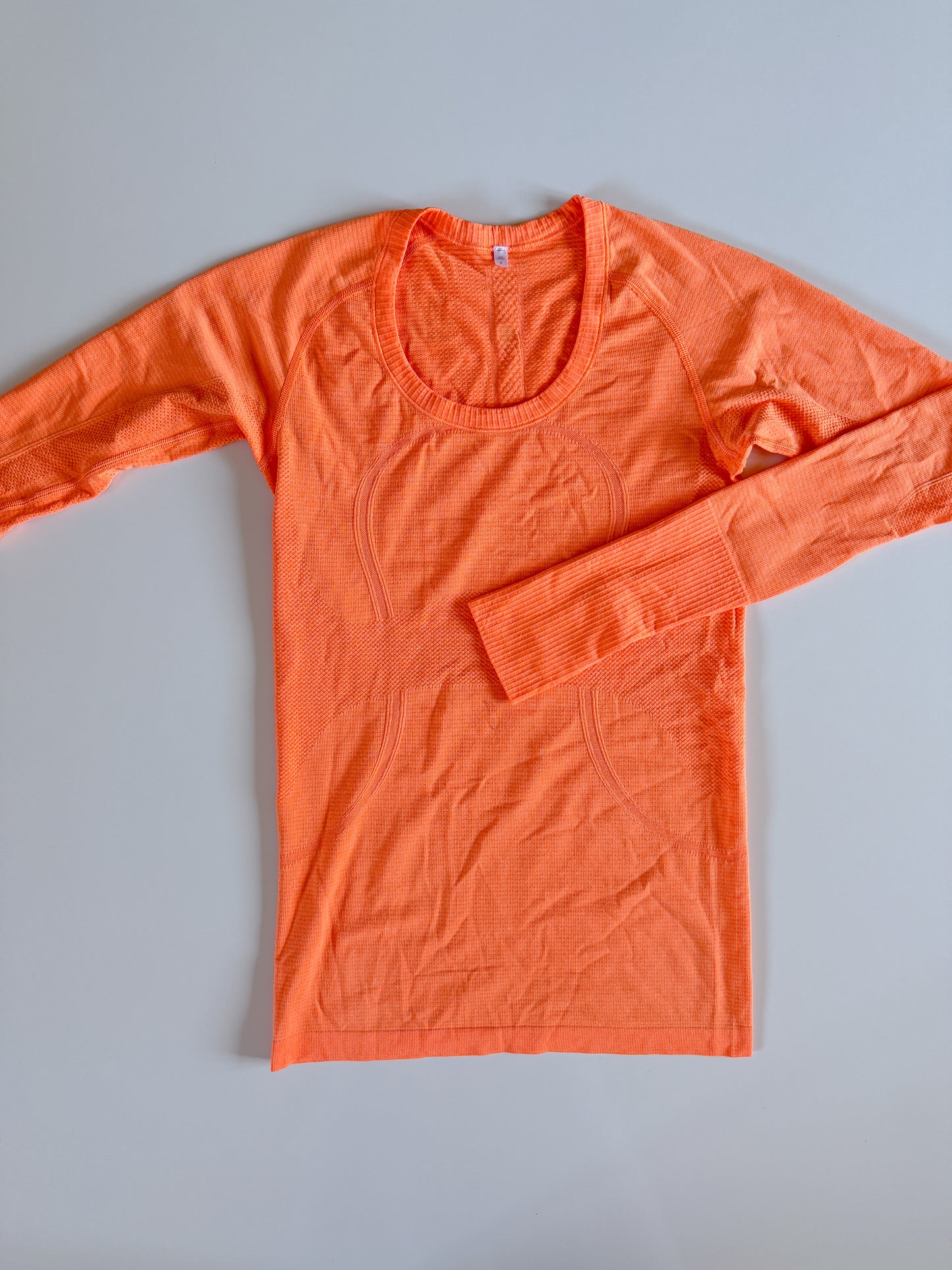 Size 6 Orange Soda Swiftly Tech Long Sleeve