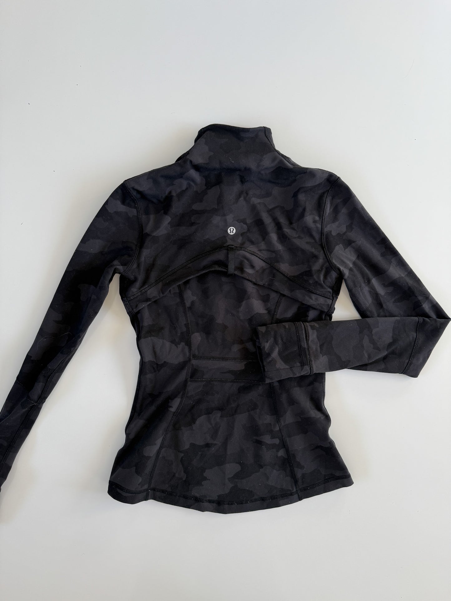 Size 4 Black Camo Define Jacket description
